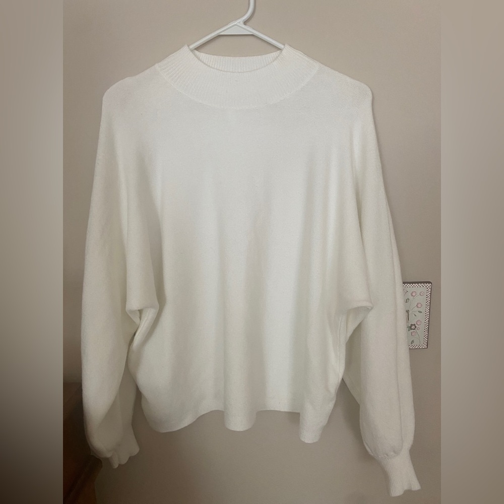 white sweater